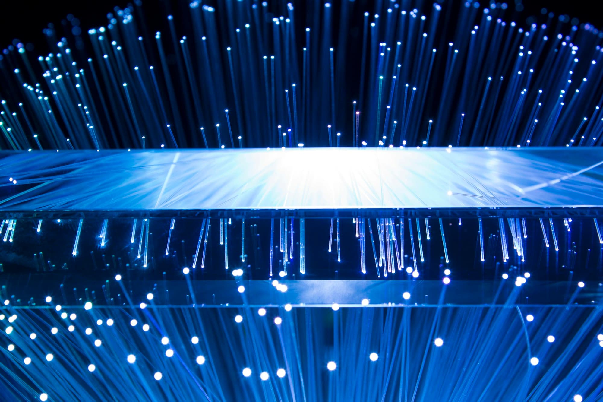 Fibre optic strands lit from below
